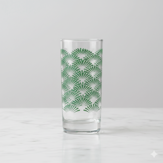 Green Deco highball glass with an Art-Deco design on a gray background