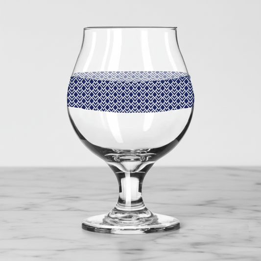 Sapphire Deco Belgian gass of beer and an Art-Deco design on a marble surface