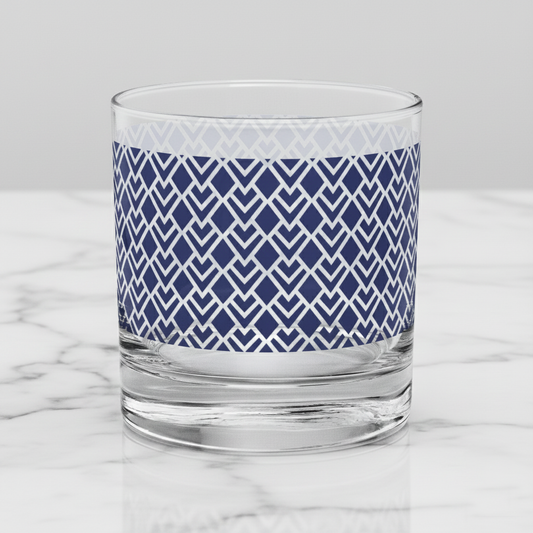 Sapphire Deco old-fashioned glass with blue Art-Deco design on a marble surface