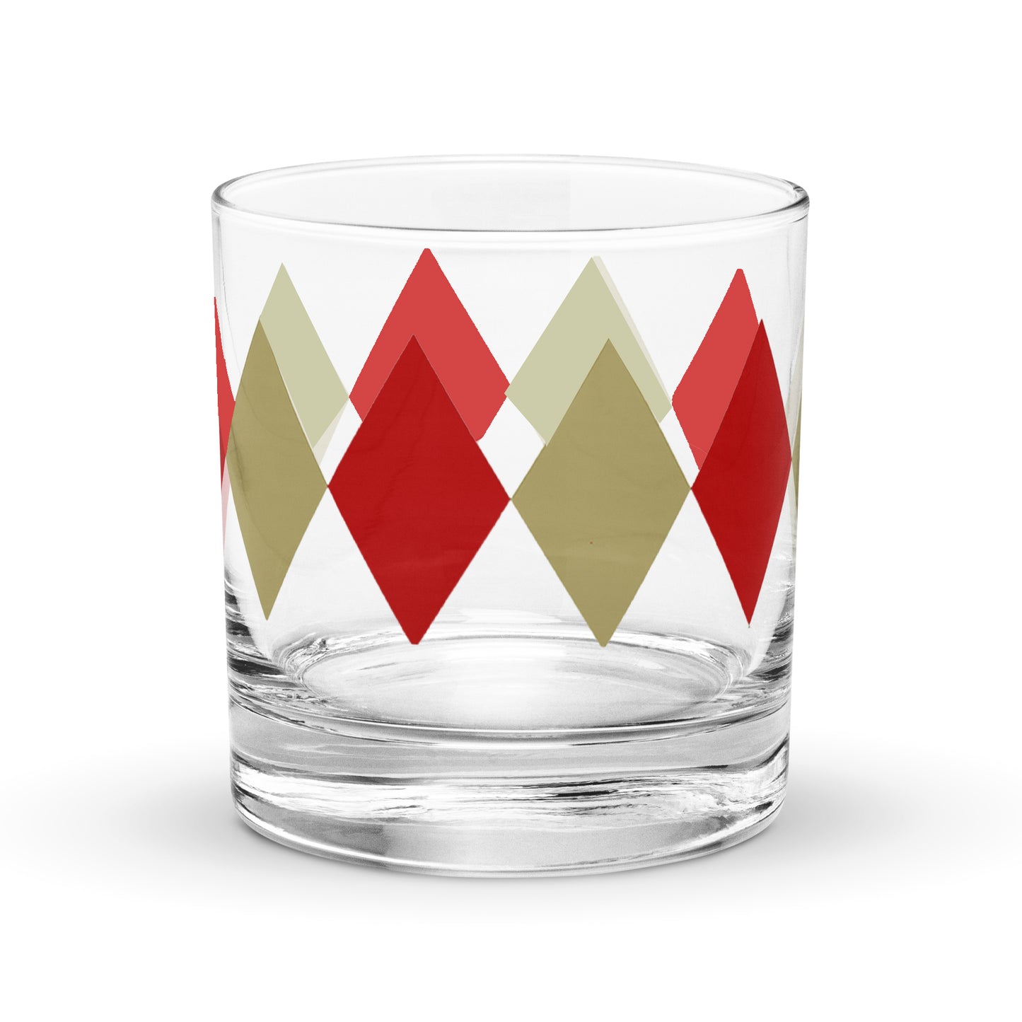 Clear glass tumbler with red and beige diamond pattern on a white background