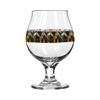 Belgian beer glass with charcoal and bronze geometric design on a white background