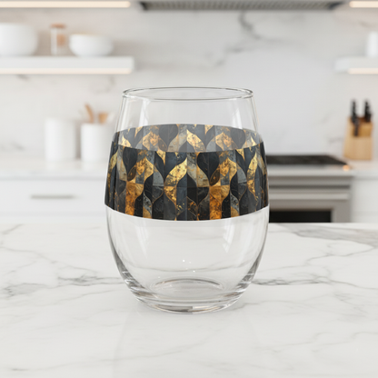 Aged Elegance stemless wine glass with charcoal and bronze patternon a marble countertop