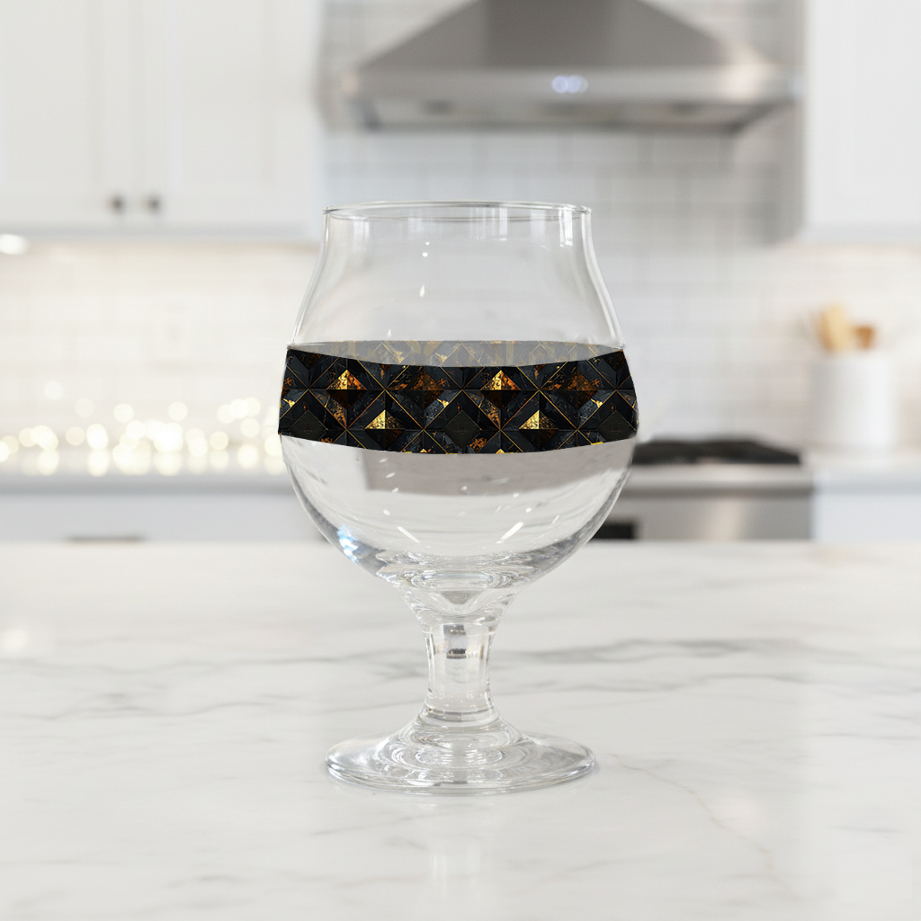 Gilded Decay Belgian glass of beer with charcaol and gold pattern on a kitchen counter