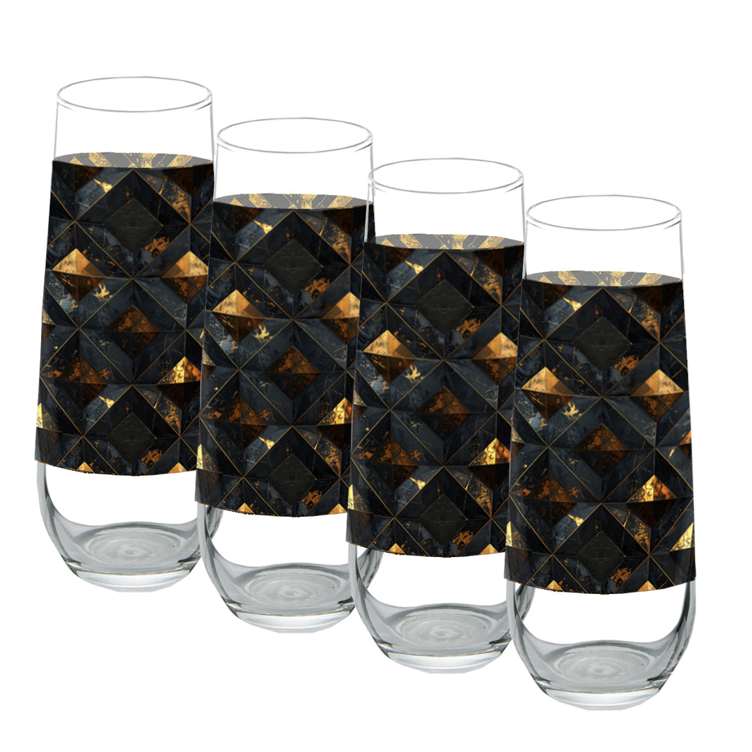 Four stemless champagne glasses with black and gold geometric patterned sleeves on a white background