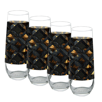 Four stemless champagne glasses with black and gold geometric patterned sleeves on a white background