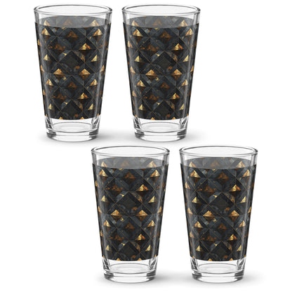Four pint beer glasses with black and gold geometric pattern on a white background