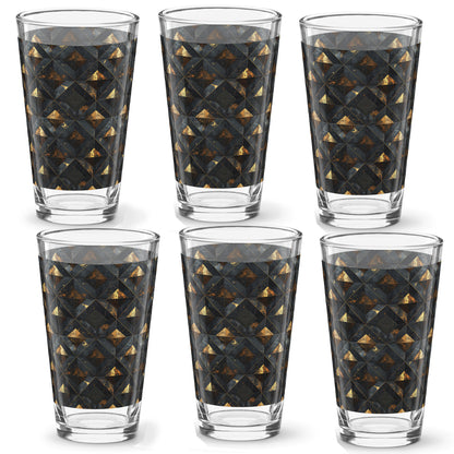 Set of six pint beer glasses with black and gold geometric pattern on a white background