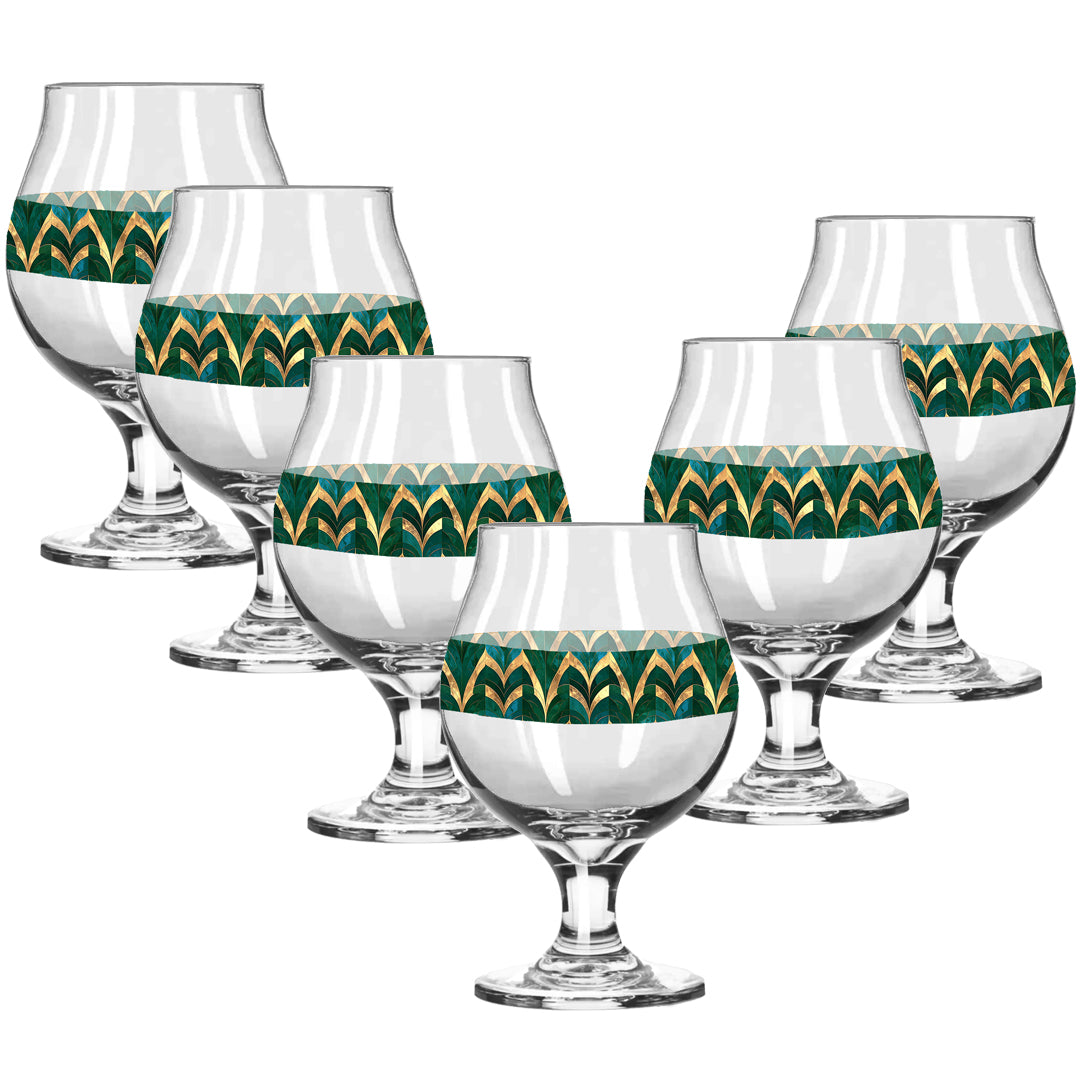 Set of eight Belgian beer glasses with green and gold geometric pattern on a white background