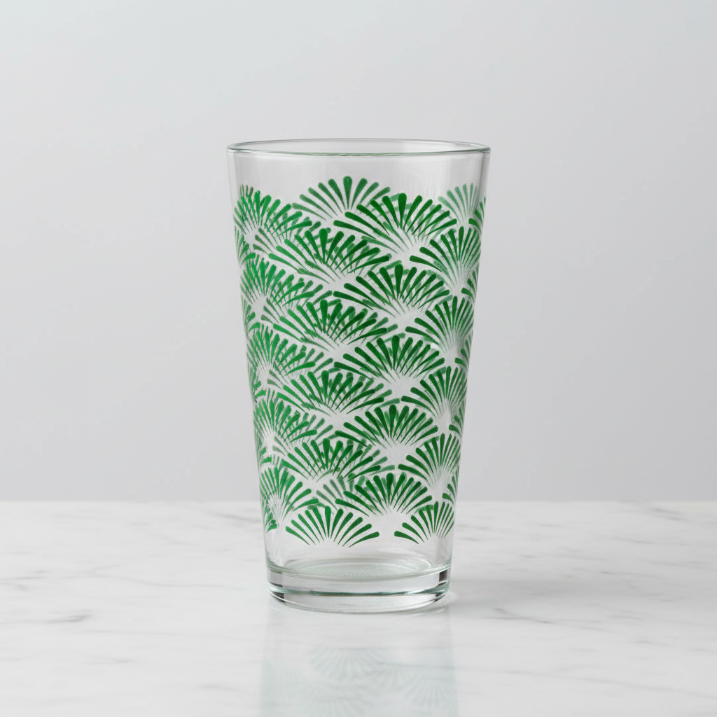 Green Deco pint glass with an Art-Deco green design on a white background