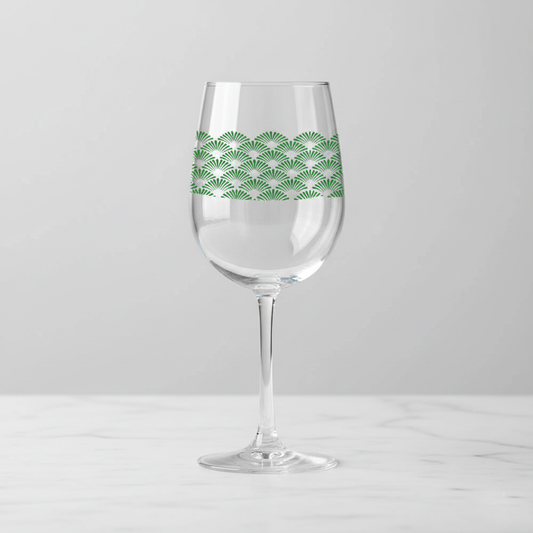 Deco Green tall wine glass with green fan-motif pattern on a white background