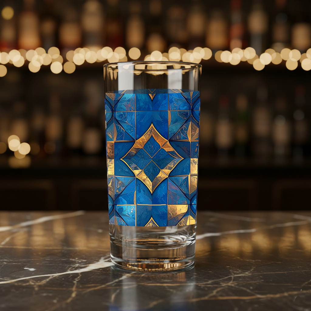 Moroccan Treasure highball glass with turqoise and gold geometric design on a bar counter