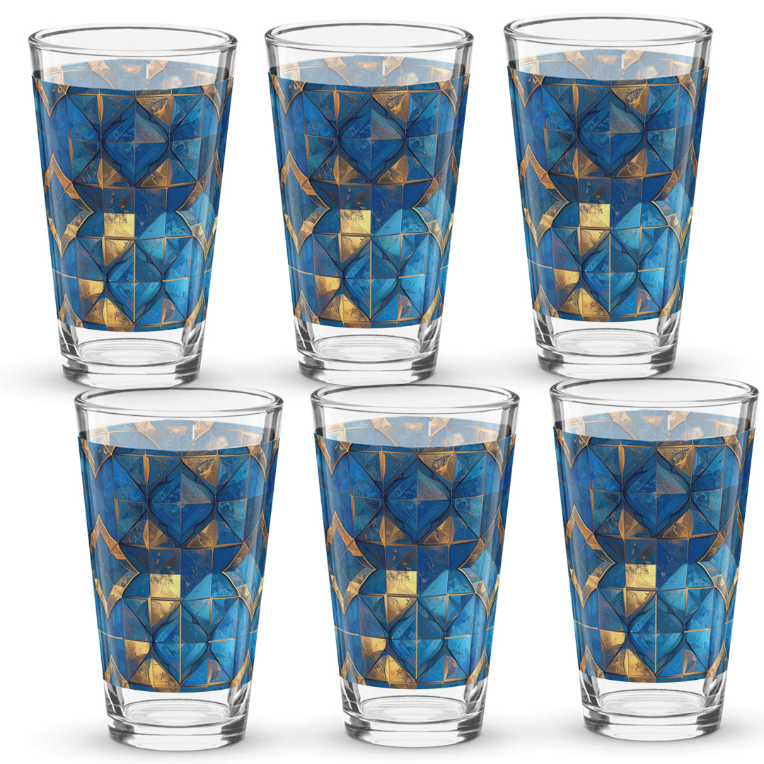 Set of six pint beer glasses with turqoise and gold geometric design on a white background