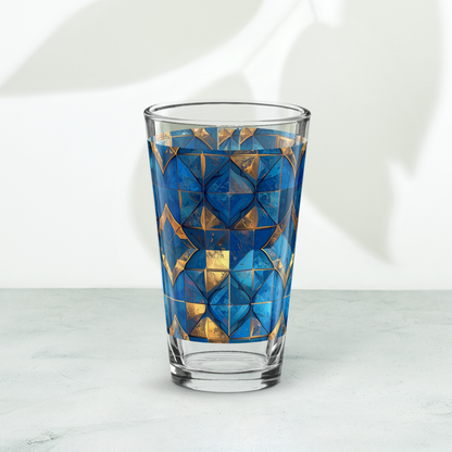 Moroccan Treasure pint beer glass closeup with turquoise and gold design on a white background