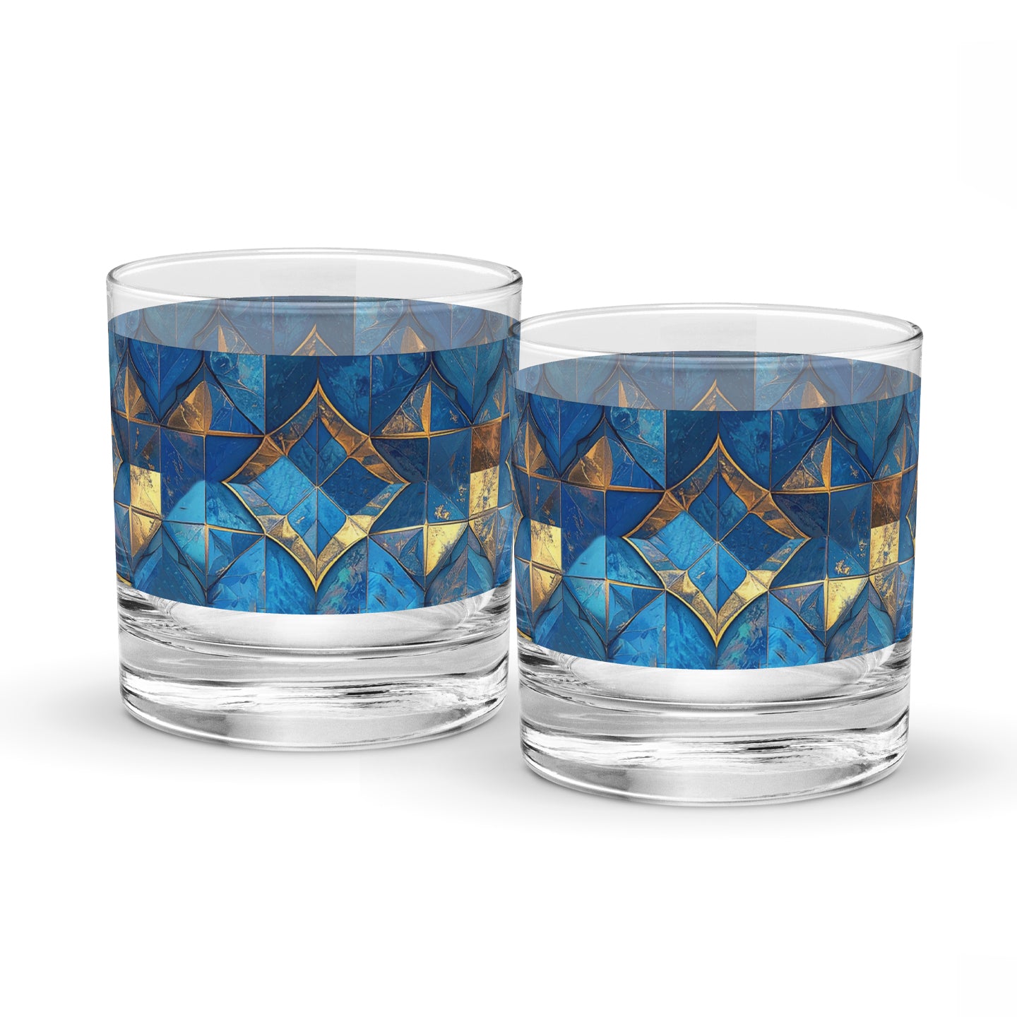 Two rock glasses with turqoise and gold geometric design on a white background