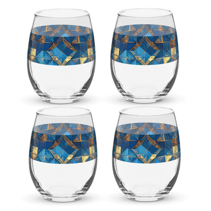 Four stemless wine glasses with turqoise and gold geometric design on a white background