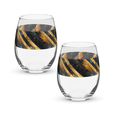 Two clear stemless wine glasses with black and gold geometric design on a white background