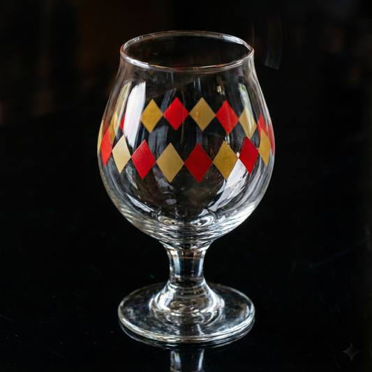 Ruby and Gold Belgian glass harlequin diamond design on a black background