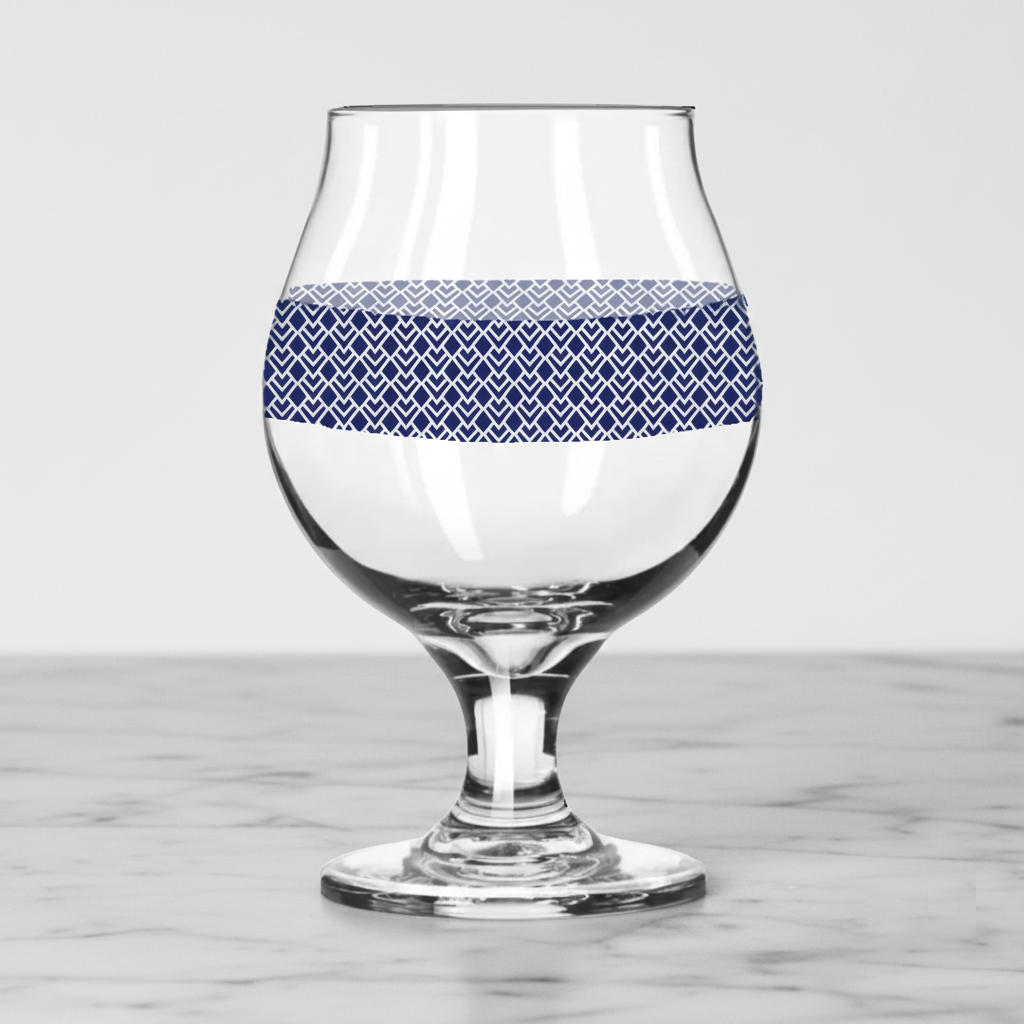 Sapphire Deco Belgian gass of beer  and an Art-Deco design on a marble surface
