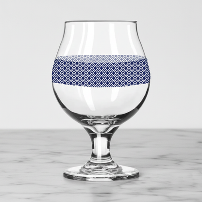 Sapphire Deco Belgian gass of beer  and an Art-Deco design on a marble surface
