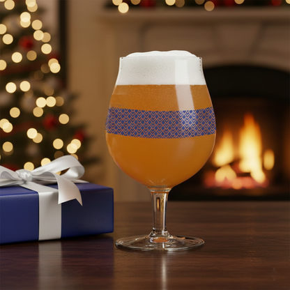 Sapphire Deco Belgian gass of beer  and an Art-Deco design, with a Christmas tree and fireplace in the background