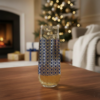 Sapphire Deco stemless flute glass decorative glass with an Art-Deco design on a wooden table in a cozy living room.